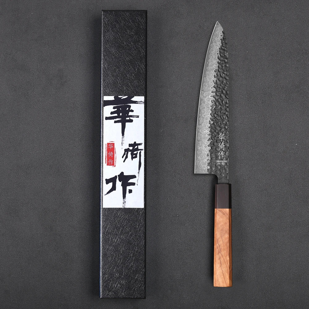 Damascus chef knife with olive wood handle from Forge Kitchens
